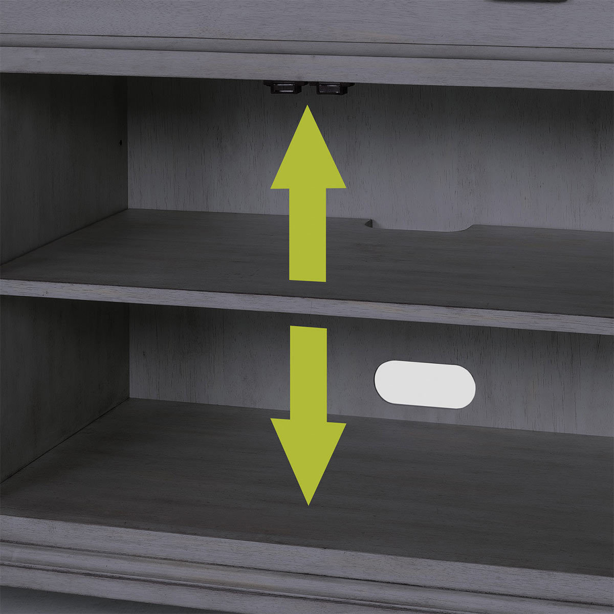 Close up of opened console showcasing adjustable shelves with green arrows