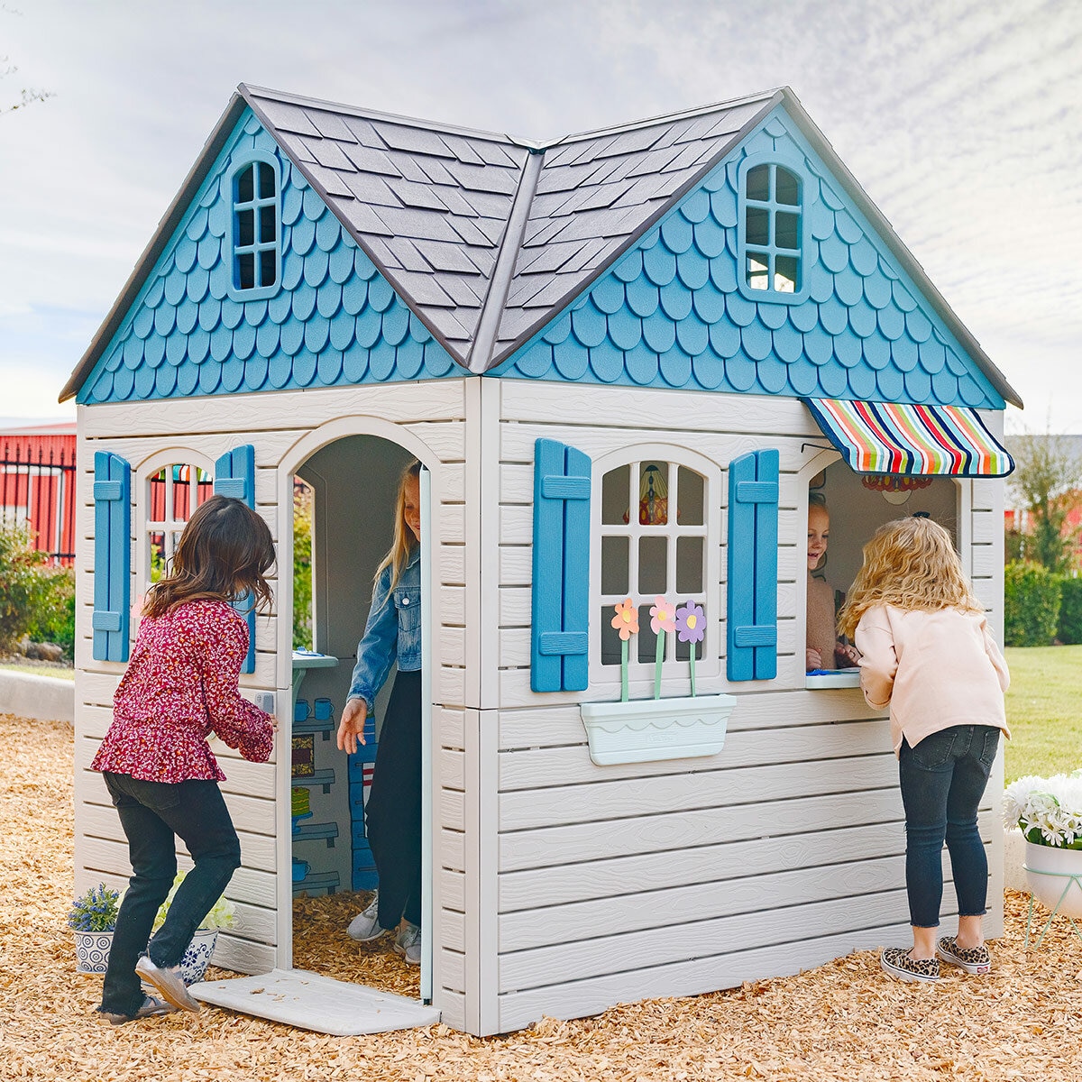 Lifestyle image of children playing in the Lifetime 7ft (2.2m) Imagination Playhouse Lifestyle image of children playing in the Lifetime 7ft (2.2m) Imagination Playhouse