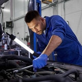 Mechanic using Medicom Vulcan Nitrile Gloves