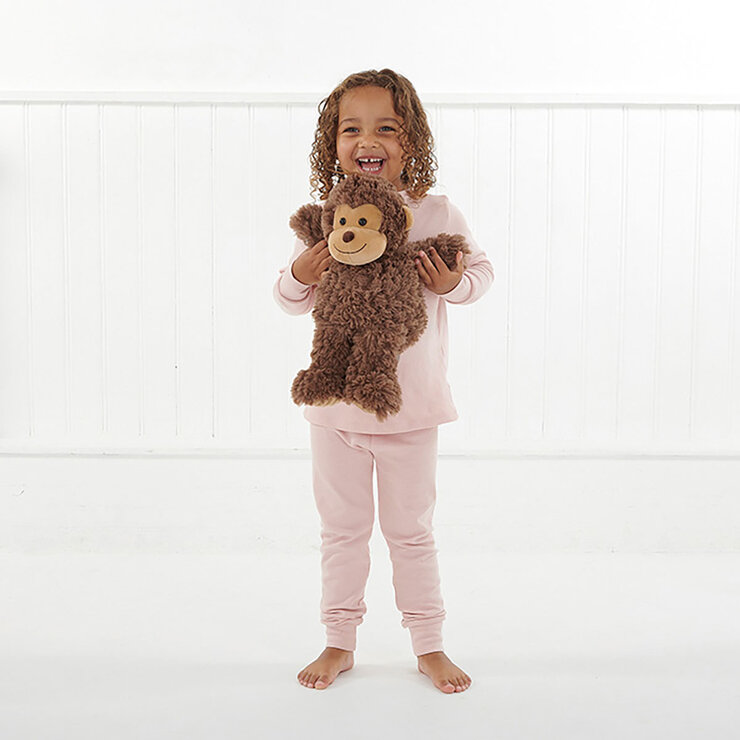 Girl Standing Holding Monkey Girl Standing Holding Monkey
