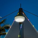 Lifestyle image of the string lights hanging from the top of a tent