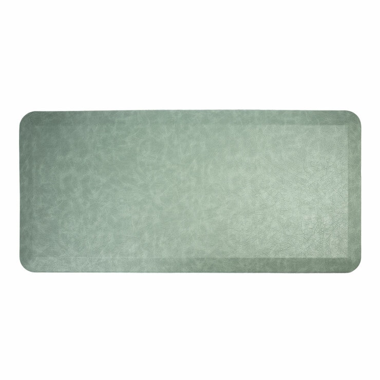 Sage green anti fatigue mat in a white background
