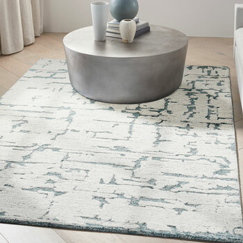 Calvin Klein Sculptural Teal Rug in 2 Sizes