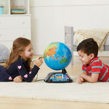 Children playing with the Leapfrog interactive globe
