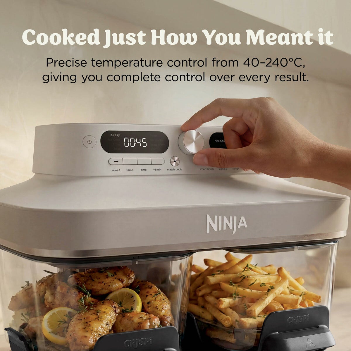 Lifestyle image of air fryer with precise temperature control from 40 to 240 degrees