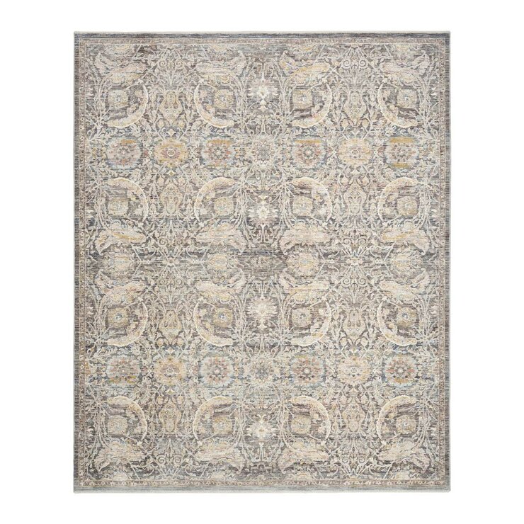 Grey and beige rug with detailed symmetrical pattern and vintage-style accents