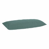 Quilted green body pillow with diamond stitching placed in front of two white pillows on a neatly Quilted green body pillow with diamond stitching placed in front of two white pillows on a neatly