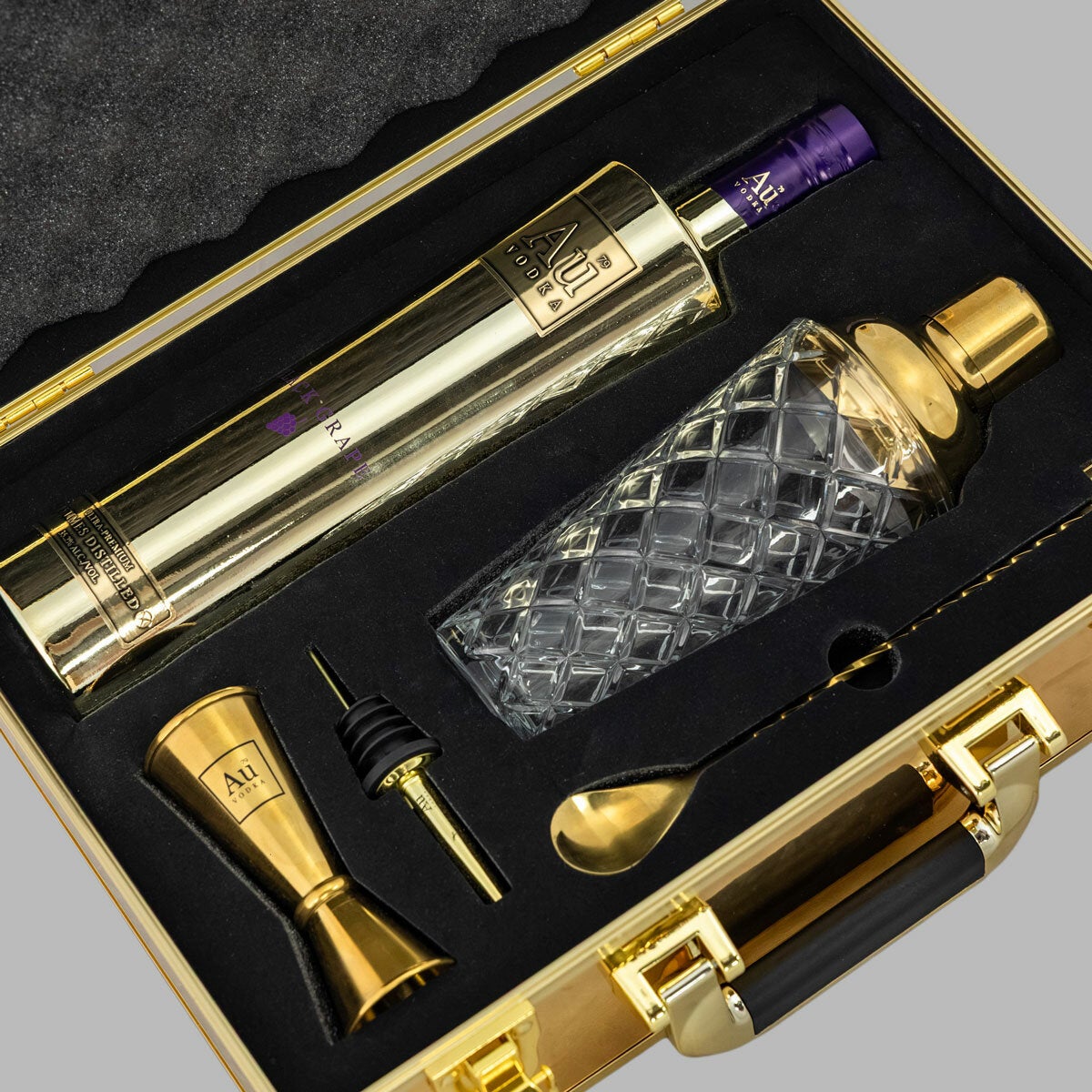 AU Briefcase opened showing bottle and shacker kit