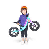 Dino Trike in purple with kid riding it