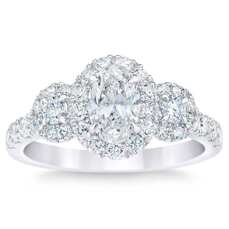 1.52ctw Oval & Round Brilliant Cut Diamond Three Stone Halo Ring, 14ct White Gold 1.52ctw Oval & Round Brilliant Cut Diamond Three Stone Halo Ring, 14ct White Gold