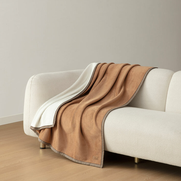 Camel throw on sofa Camel throw on sofa