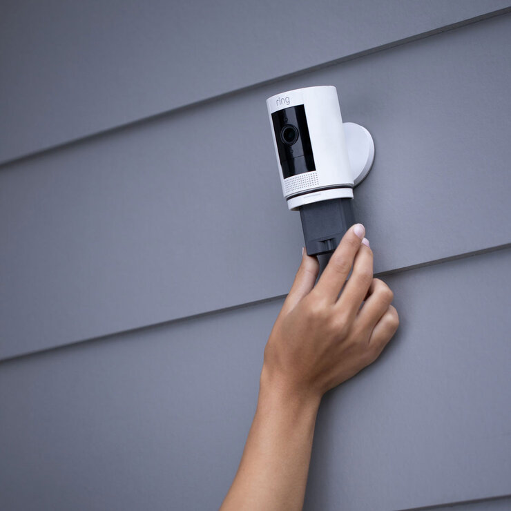 Lifestyle image of camera getting its battery changed