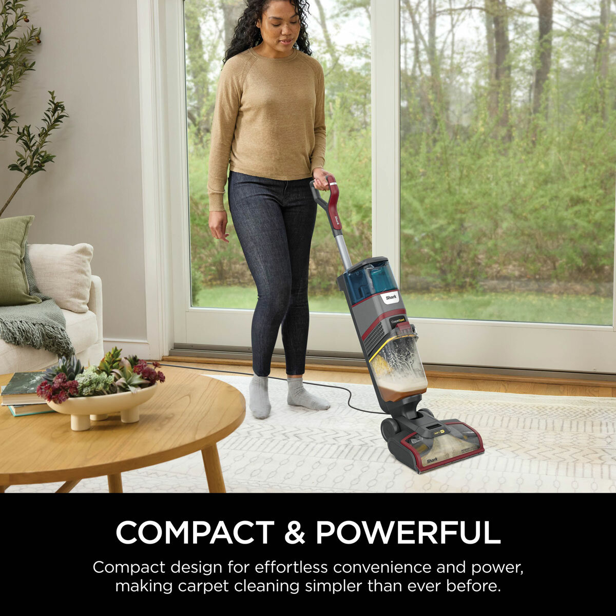 Lifestyle image of Shark CarpetXpert HairPro Pet Deep Carpet Cleaner showing being used on a large rug