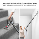 Lifestyle image of Dyson Big Ball Animal 2 being used with different cleaning tools