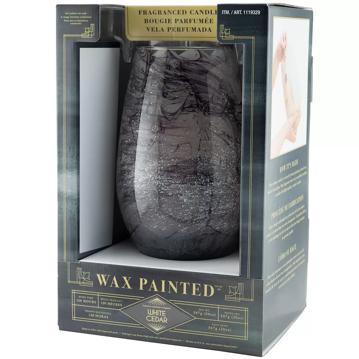 Lifetsyle image of grey candle in packaging side on
