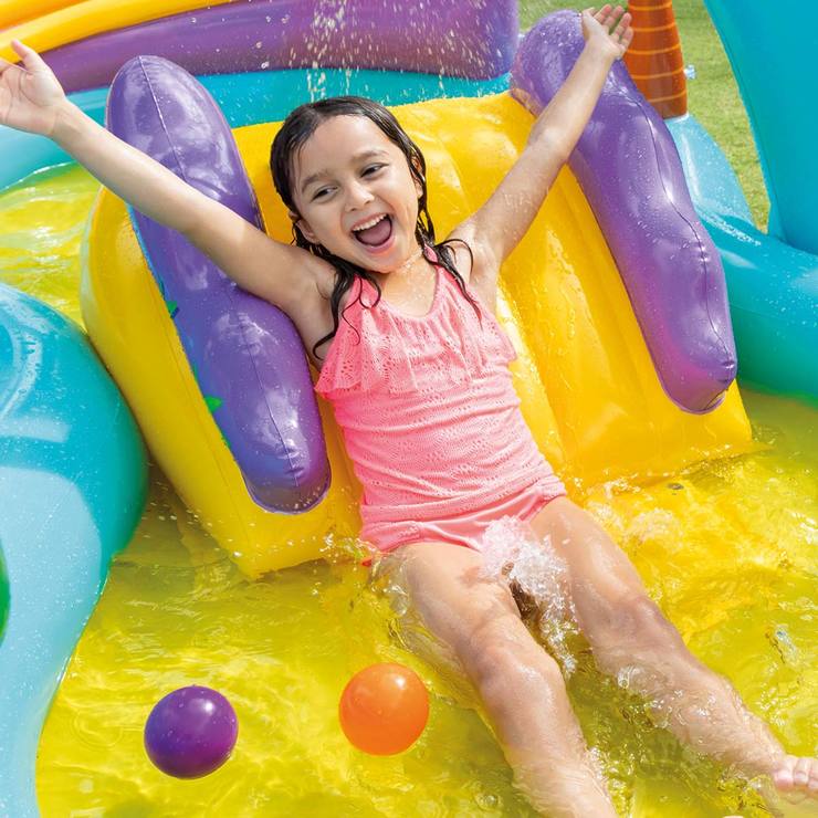 Child playing in Dinoland kids pool