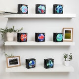 Lifestyle image of the footballs, individually boxed and on display on a shelf