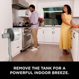 Lifestyle image of  Shark FlexBreeze Pro Mist Indoor & Outdoor Fan & Outdoor Misting System used in the kitchen