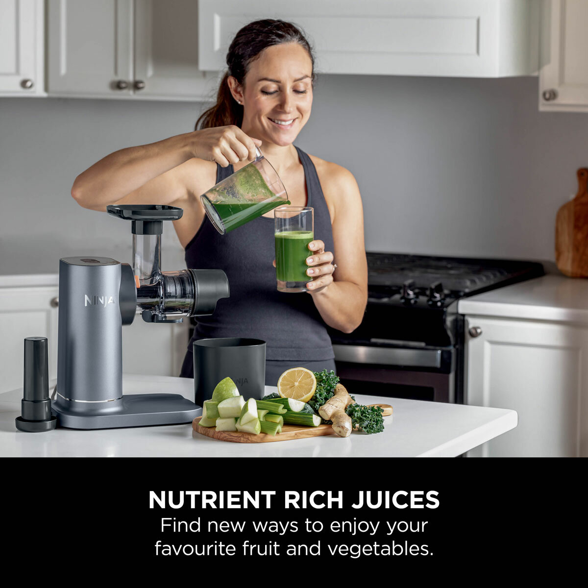Lifestyle image of Ninja Cold Press Juicer showing powerful auger Lifestyle image of Ninja Cold Press Juicer showing powerful auger
