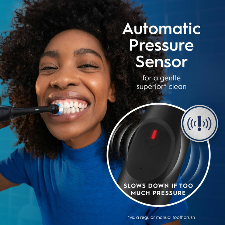 Lifestyle image of Oral-B iO2 Electric Toothbrush with automatic pressure sensor