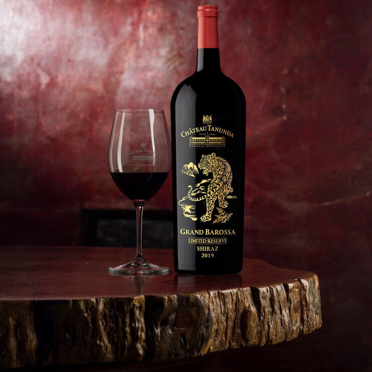 Chateau Tanunda Year of the Tiger Barossa Shiraz with wine glass Chateau Tanunda Year of the Tiger Barossa Shiraz with wine glass