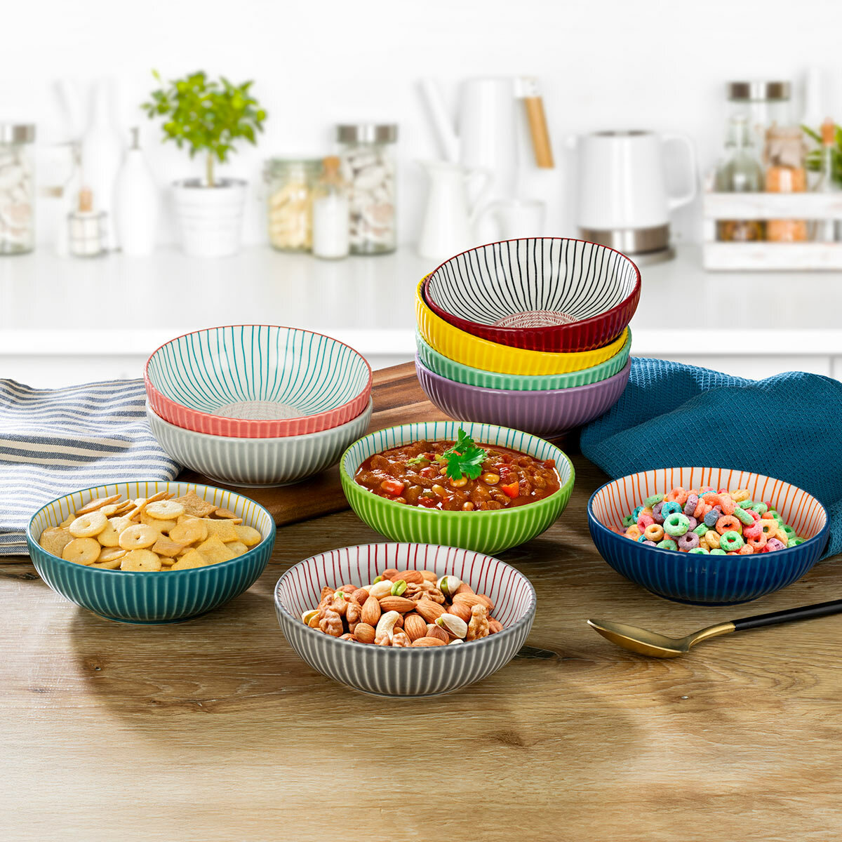 signature houseware stoneware bowls with food on kitchen counter