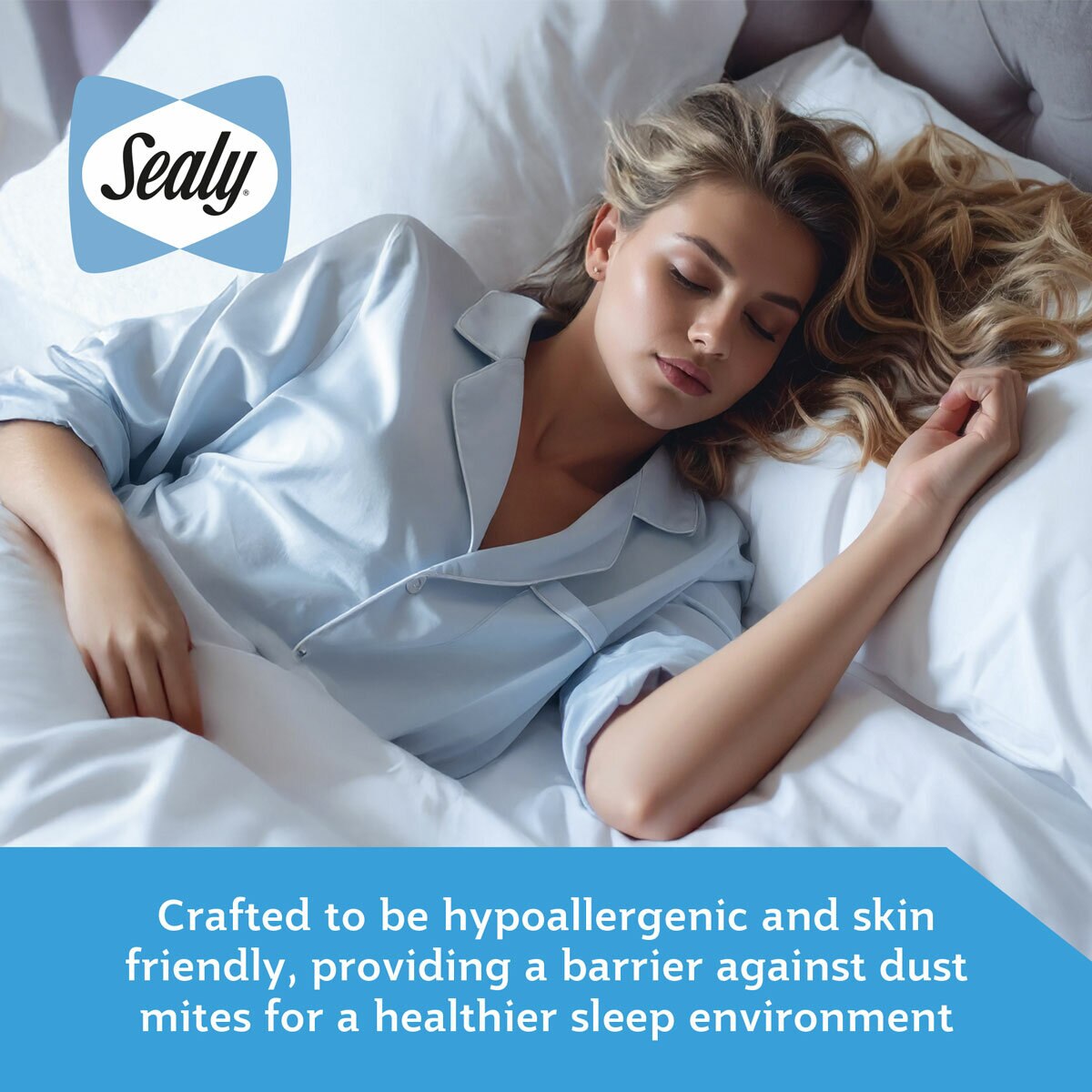 A fitted white mattress protector with a hexagonal quilted pattern on a neatly made bed in a modern bedroom