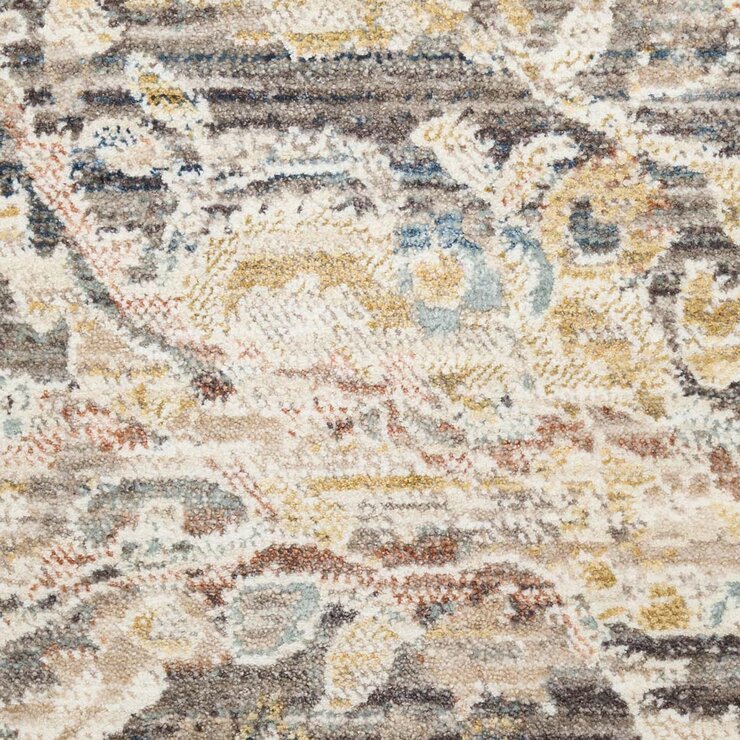 Grey and beige rug with detailed symmetrical pattern and vintage-style accents