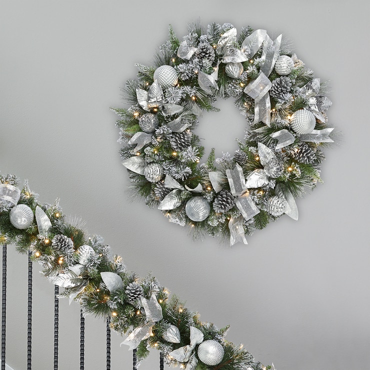 Silver decorated wreath on lifestyle background Silver decorated wreath on lifestyle background