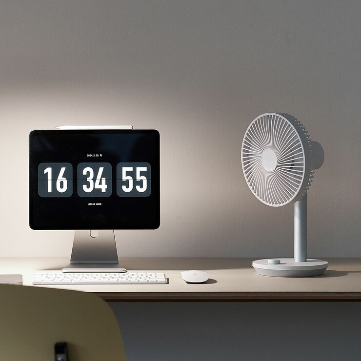 Lifestyle image of Lumena Wireless Stand Fan in white Lifestyle image of Lumena Wireless Stand Fan in white