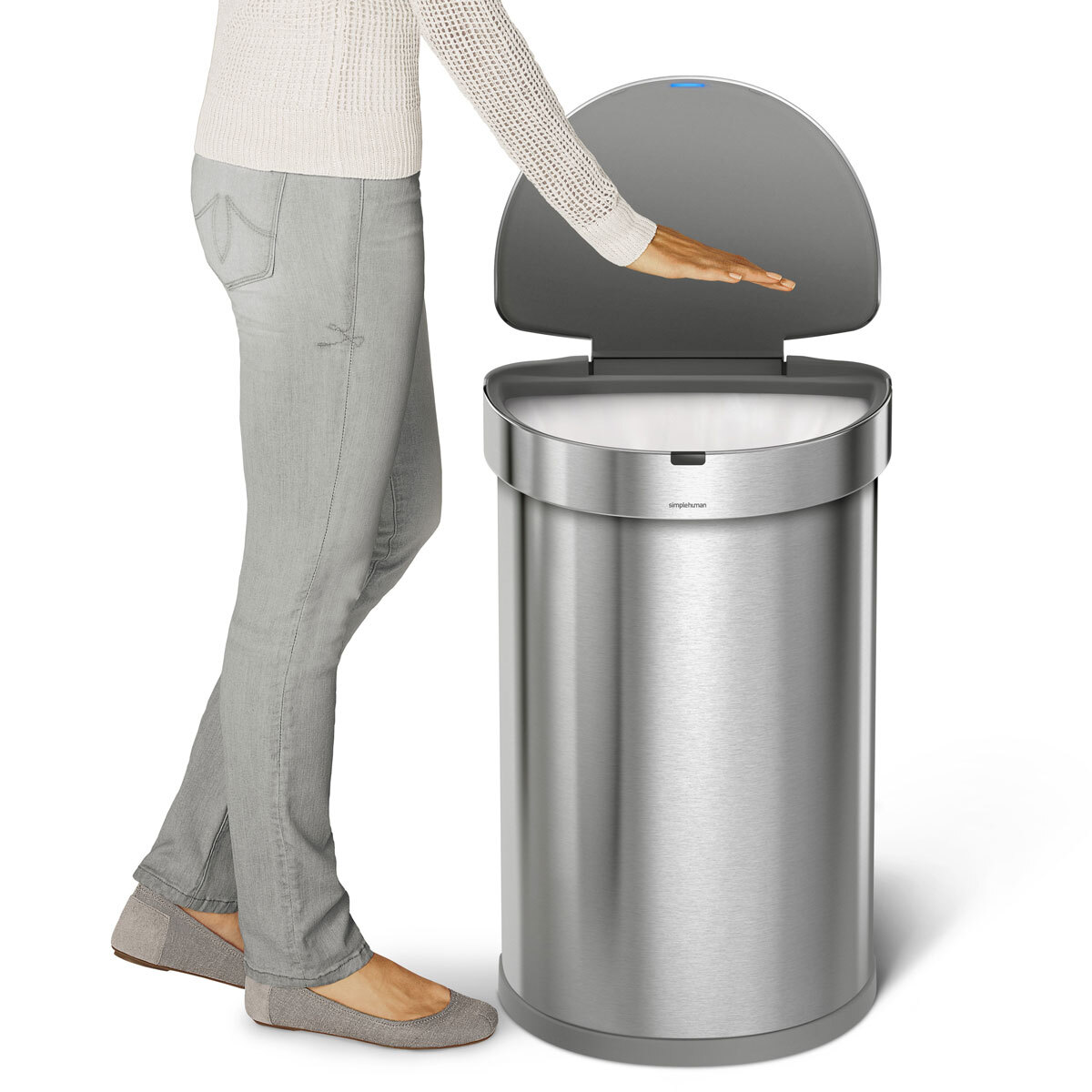 Cut out image of large bin on white background with person opening the lid