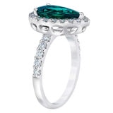 Pear Shaped Lab Emerald and 0.65ctw Diamond Ring.