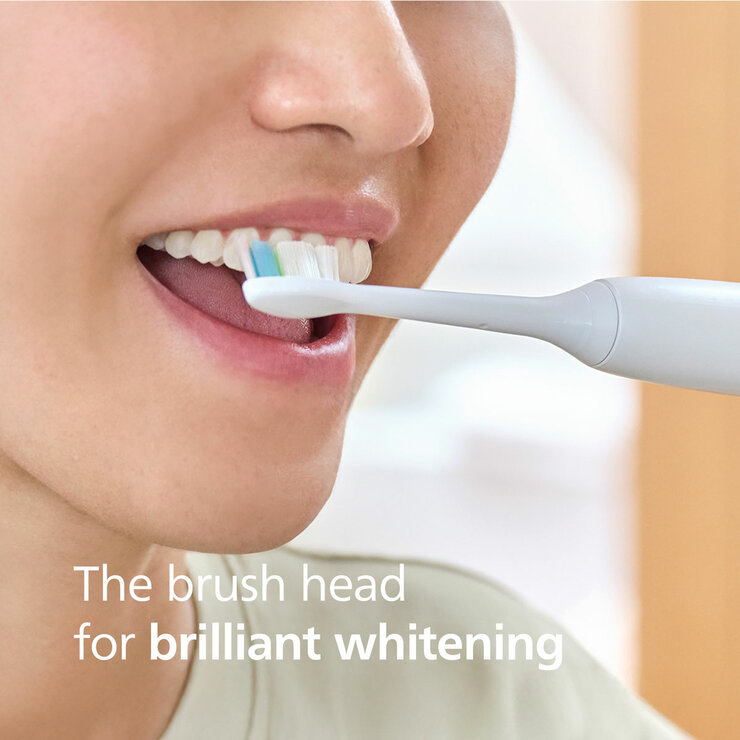 Philips Brush Head 6 Pack in White brushing teeth