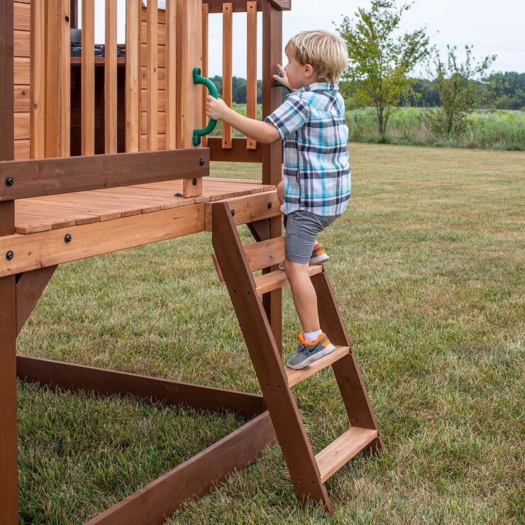 Lifestyle image showing a child climbing the ladder