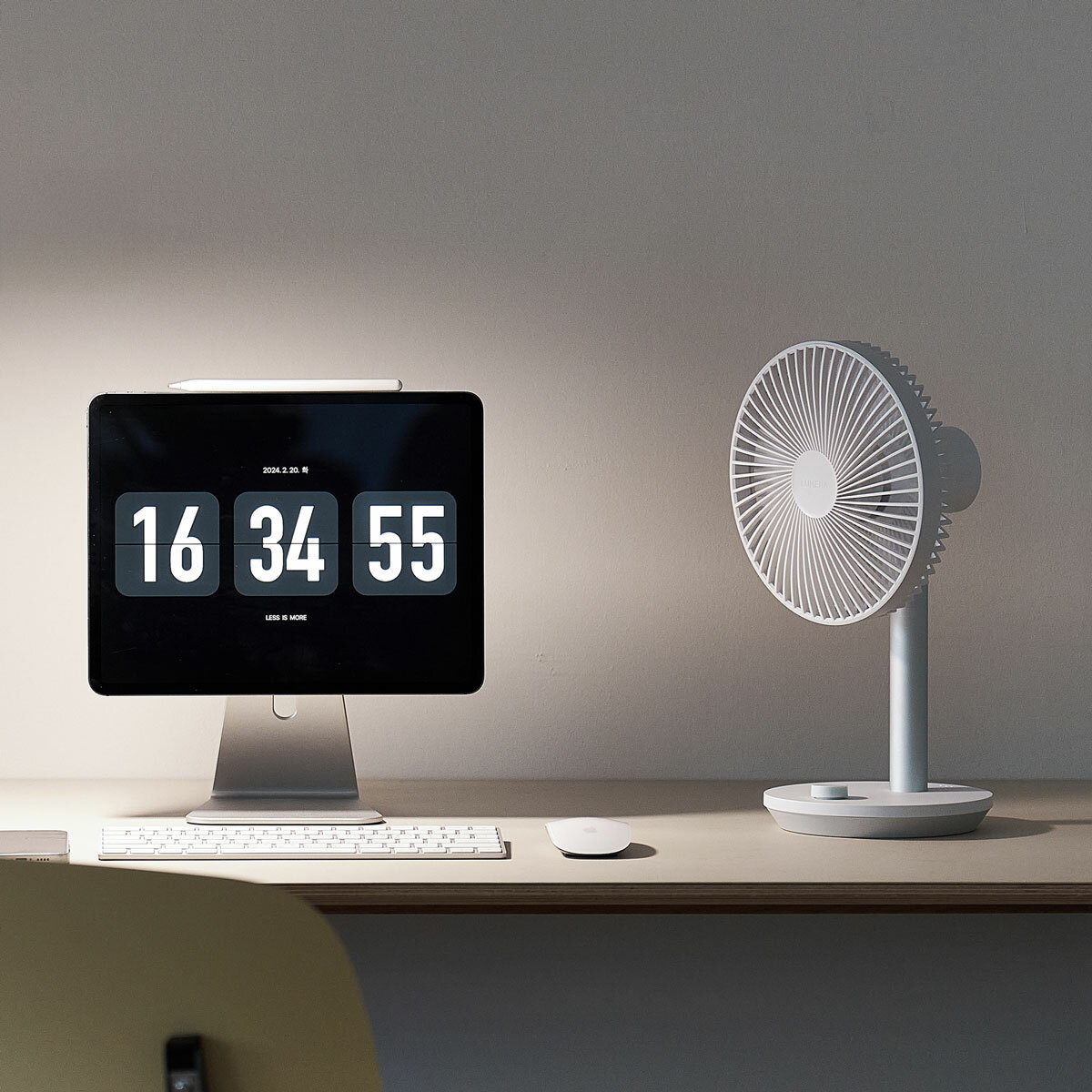 Lifestyle image of Lumena Wireless Stand Fan in white Lifestyle image of Lumena Wireless Stand Fan in white