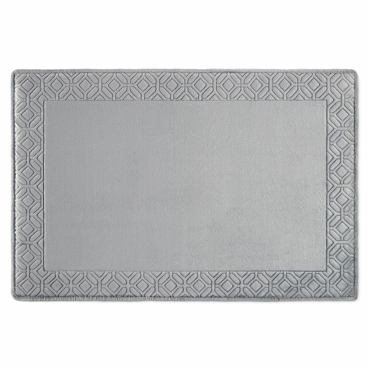 Grey bath mat with a plain background