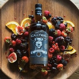 Scallywag Whiskey surrounded by fruit