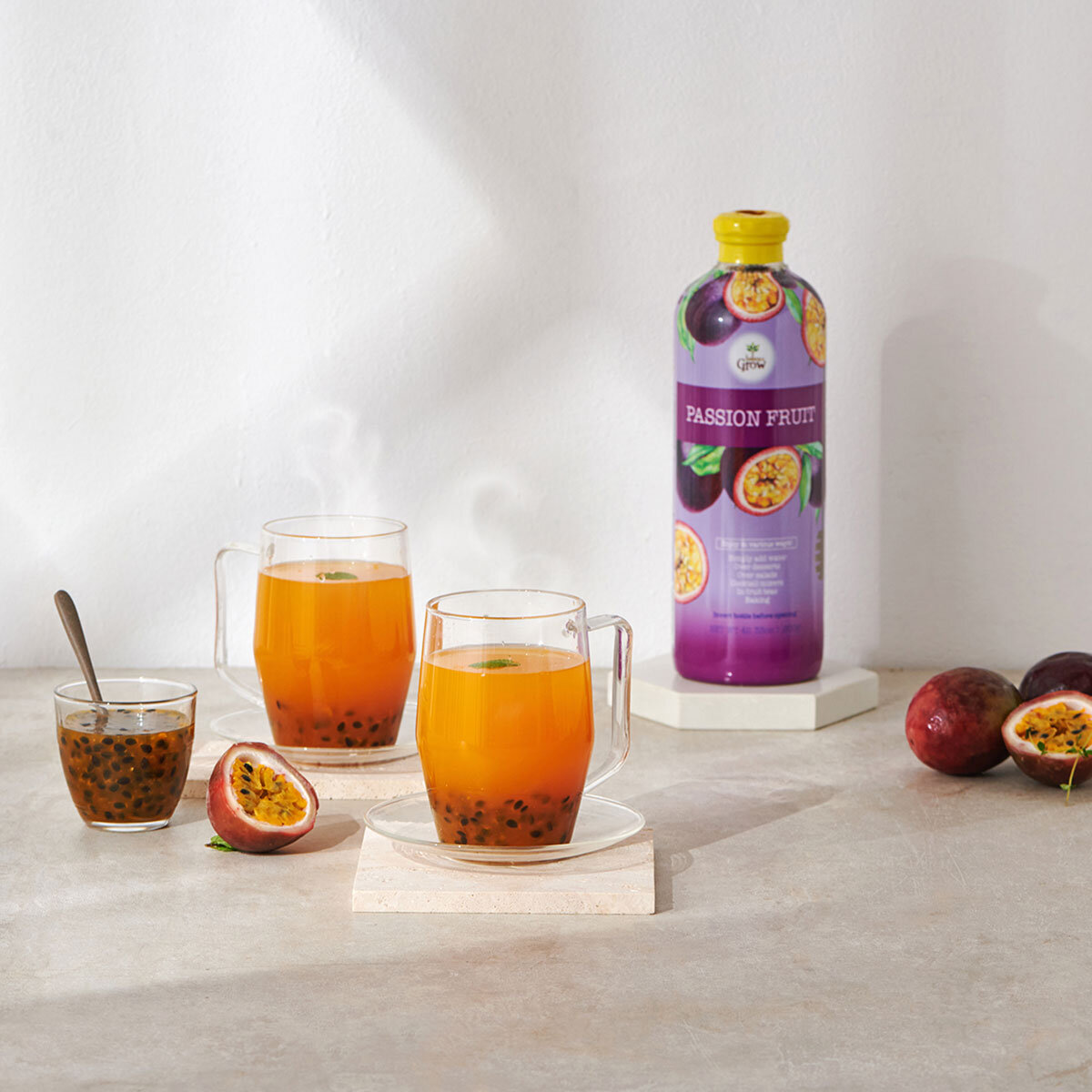 Bottle on Table with 2 Clear Mugs