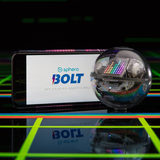 Front image of the sphero BOLT electronic interactive toy robot on a black background with neon lights and a phone displaying the app which can be used with this.