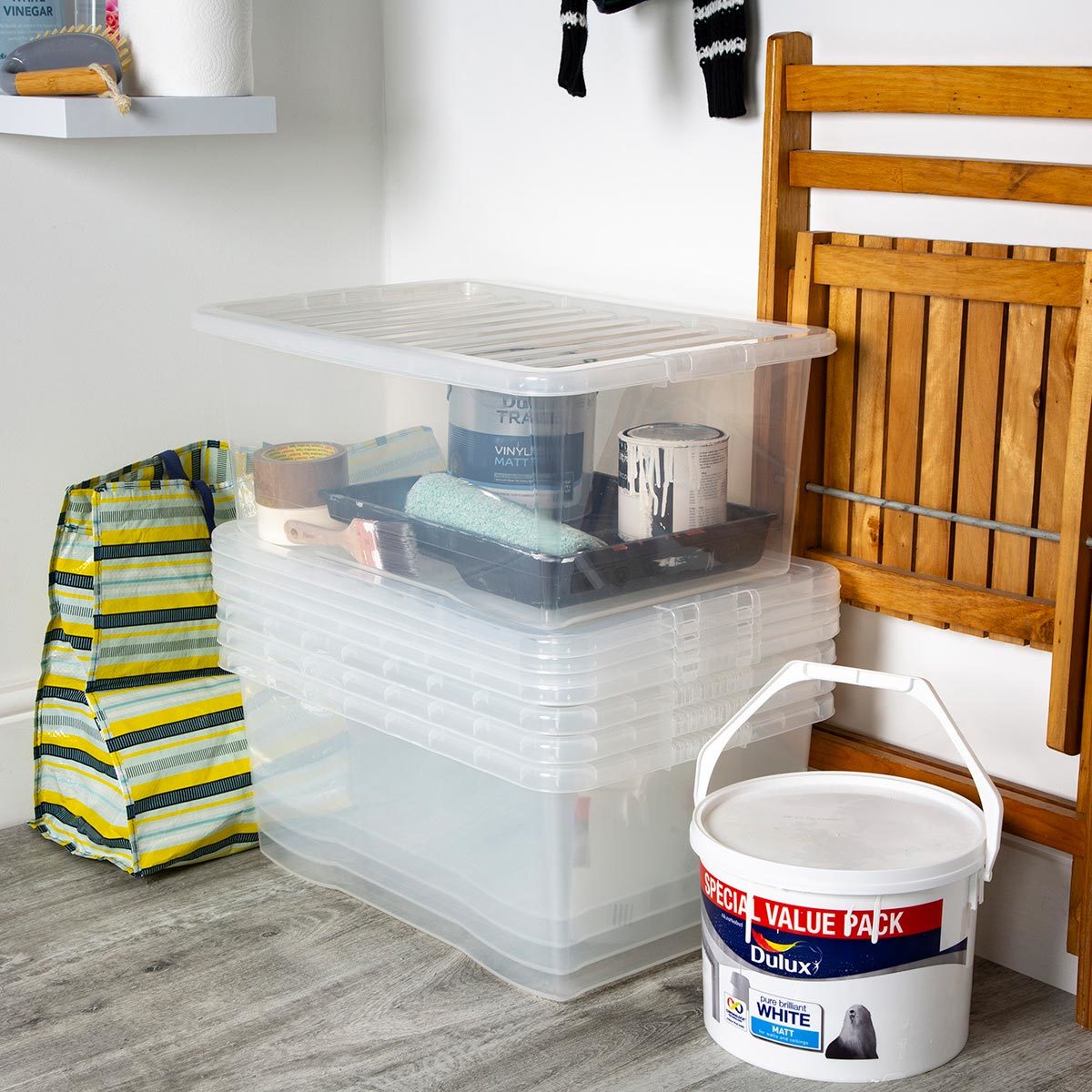 image of plastic boxes stacked in the room