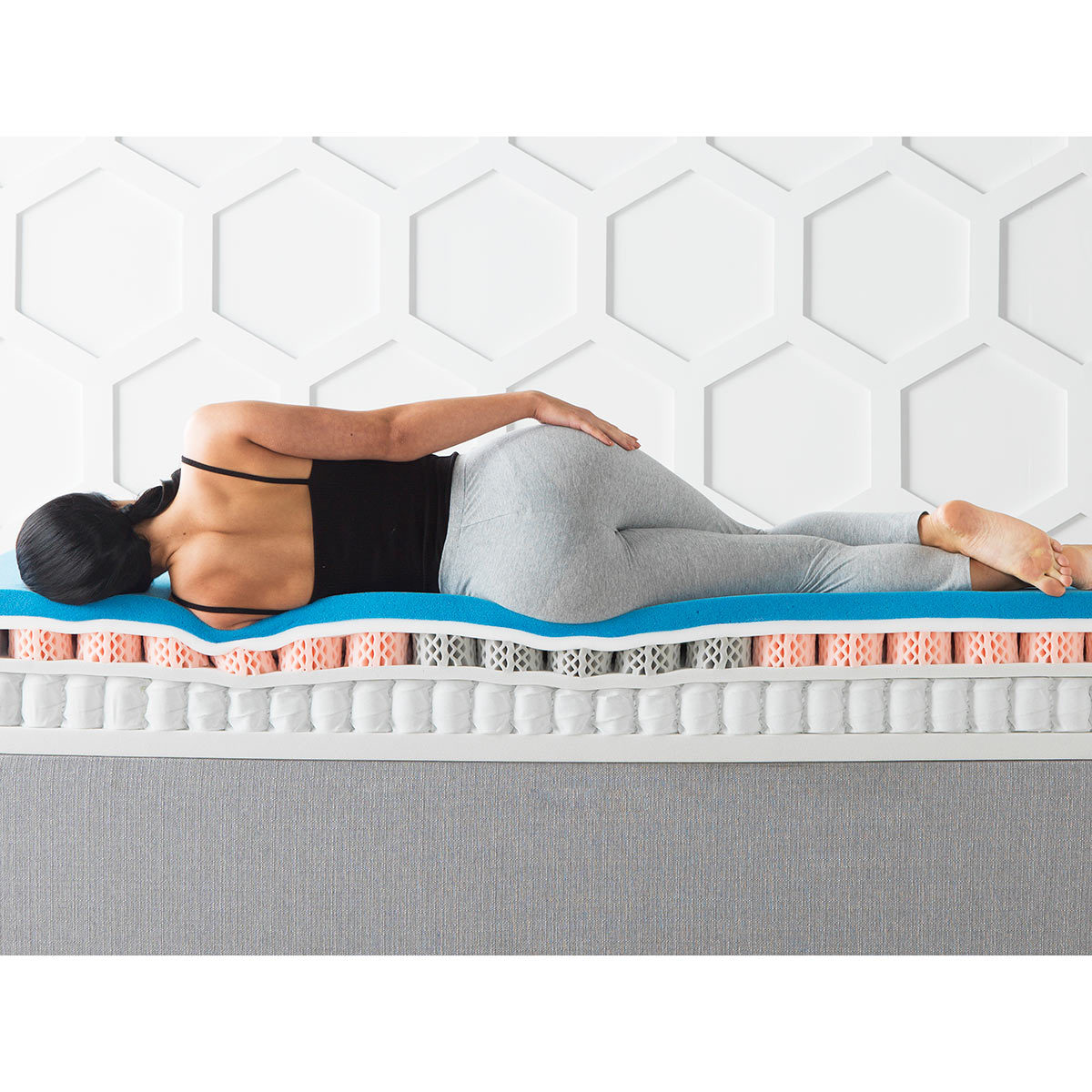 Woman lying on Dormeo Octasmart Hybrid Mattress