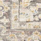 Beige and grey rug with central medallion and ornate symmetrical pattern Beige and grey rug with central medallion and ornate symmetrical pattern