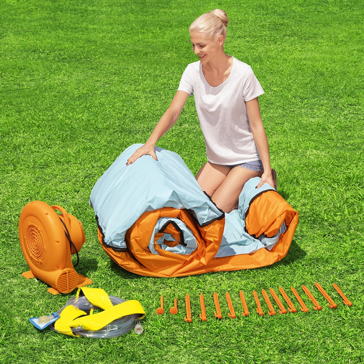 Lifestyle image of a woman setting up the blower