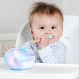 Lifestyle image of baby eating from easymat bowl & spoon