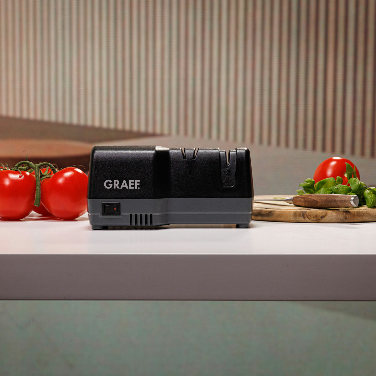 Lifestyle image of GRAEF knife sharpener on kitchen counter top Lifestyle image of GRAEF knife sharpener on kitchen counter top