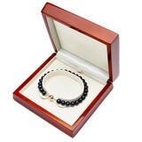 Black Pearl Bracelet, 18ct Yellow Gold in box