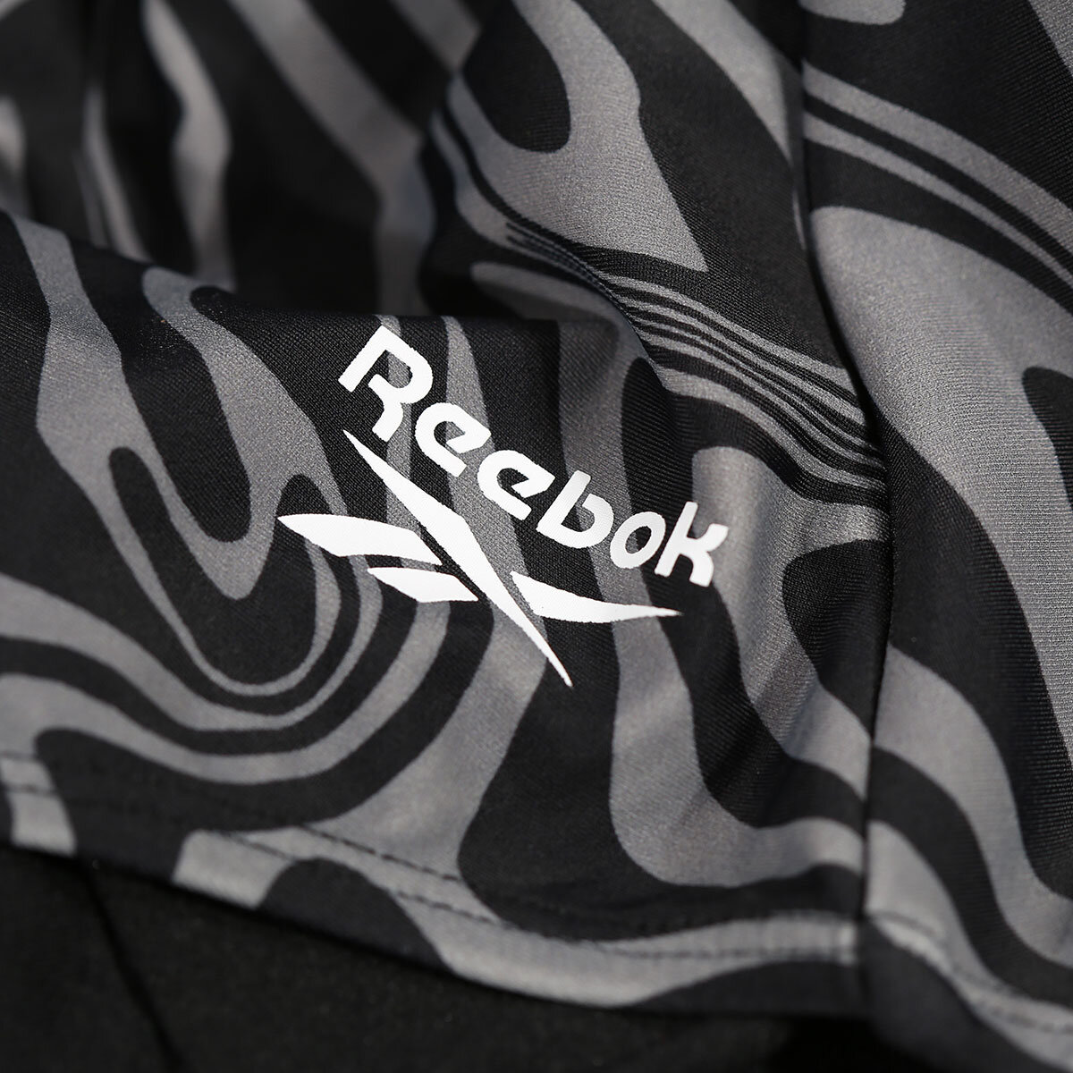Reebok 1 Piece Swimsuit in Black Animal Print