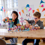 Children playing with the lego heartlake city amusement pier collection