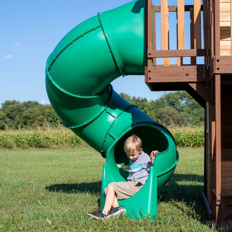 Lifestyle image of a child going down the slide