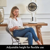 Lifestyle image of  the fan with adjustable height for flexible use